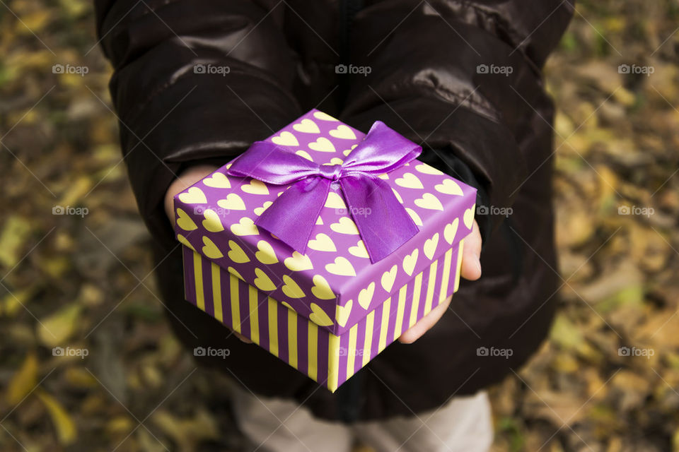 child holding gift box