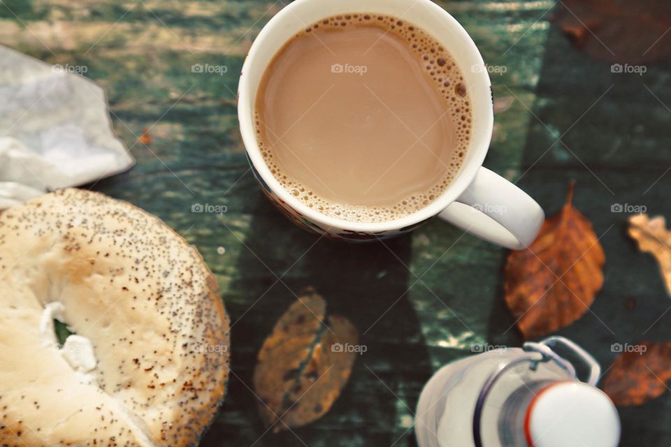 Liquid as cafe latte out in autumn on a picnic 