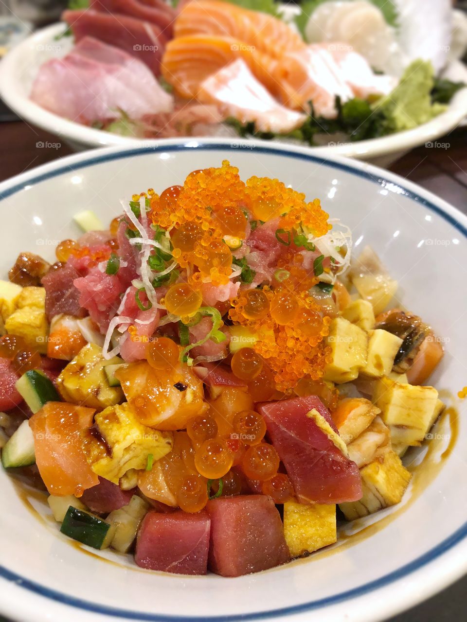 Japanese gourmet. Mixed of diced fresh raw fish or bara chirashi don. Soft focus