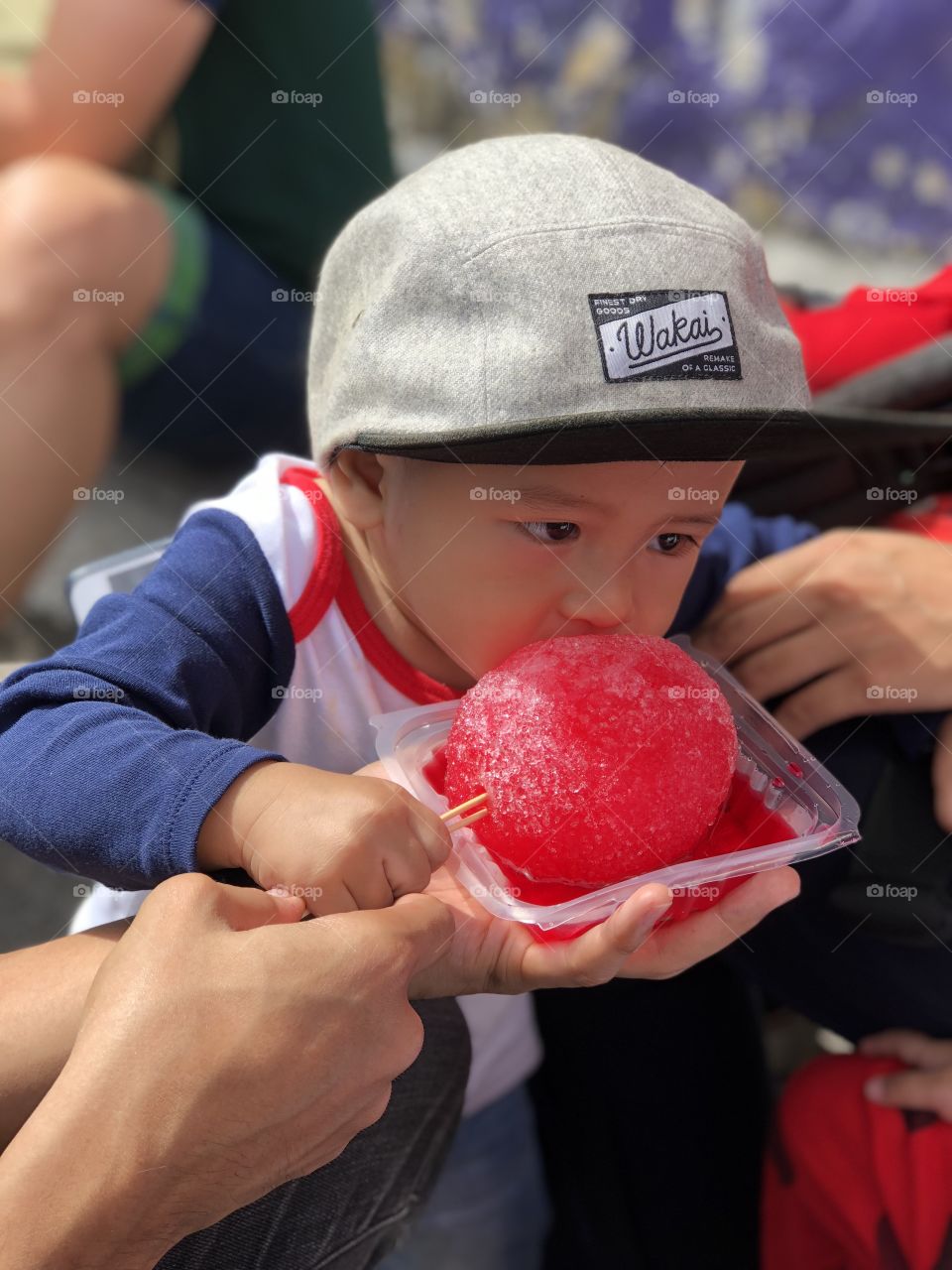Baby Boy eating Ice Ball