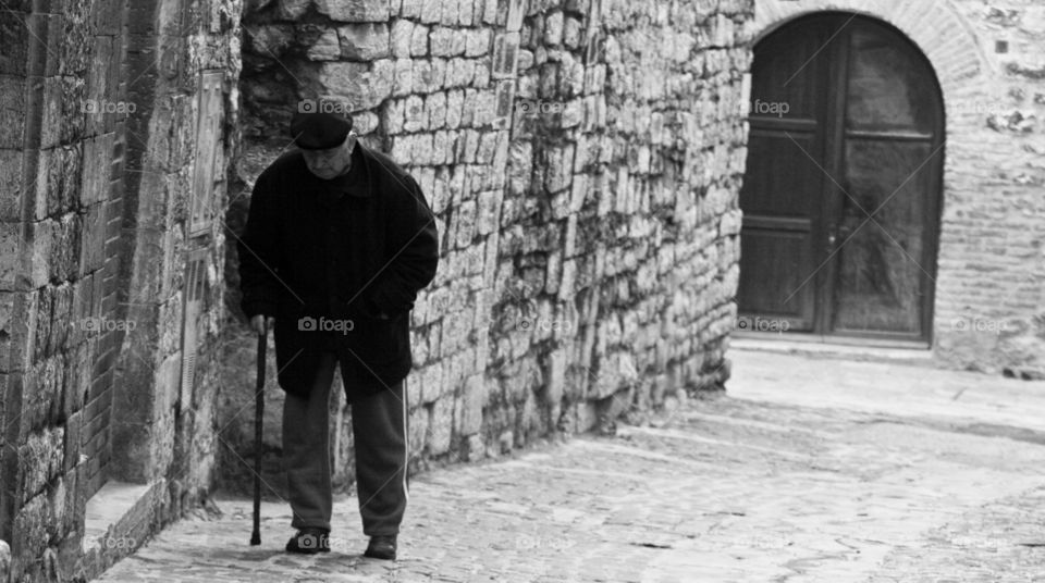 Old man walking on the street