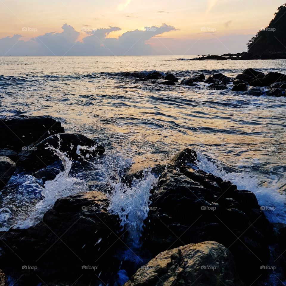 Scenic view of beach against romantic sky