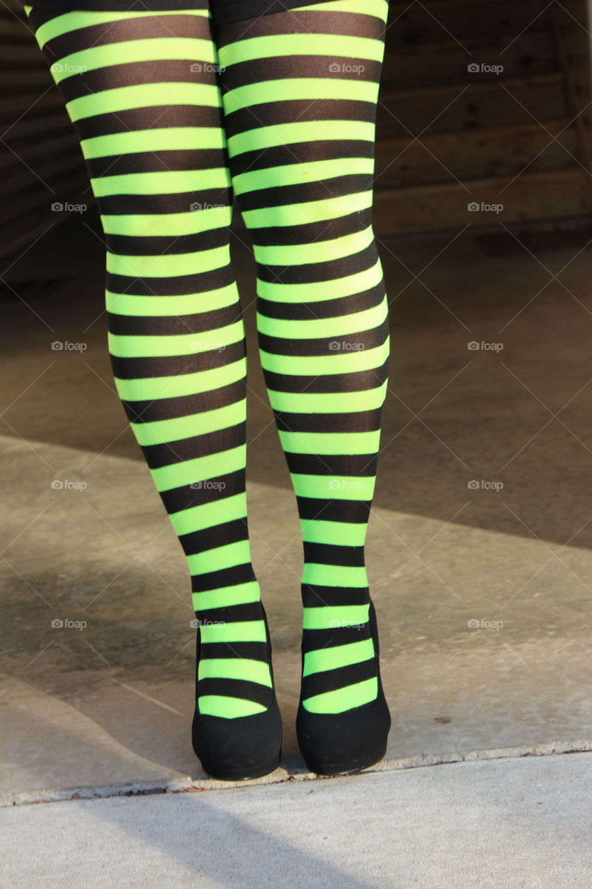 black and green striped legs