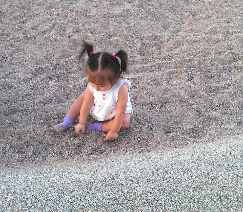 playing in the sand