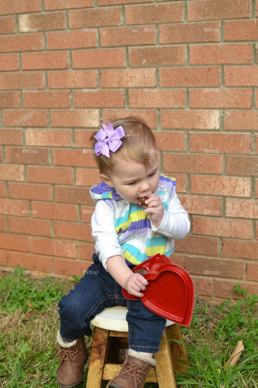 Eating candy and being cute 