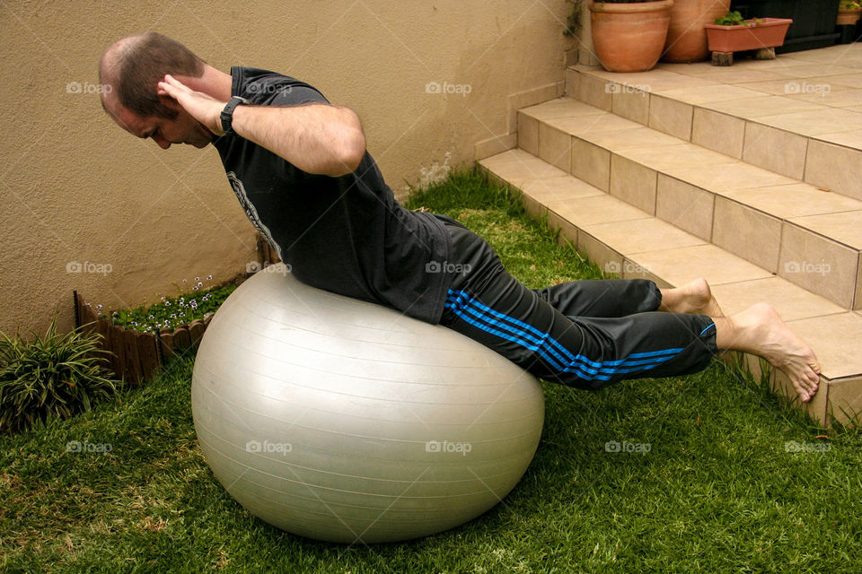 Ball lifts are good to maintain core stability during this forced homebound period