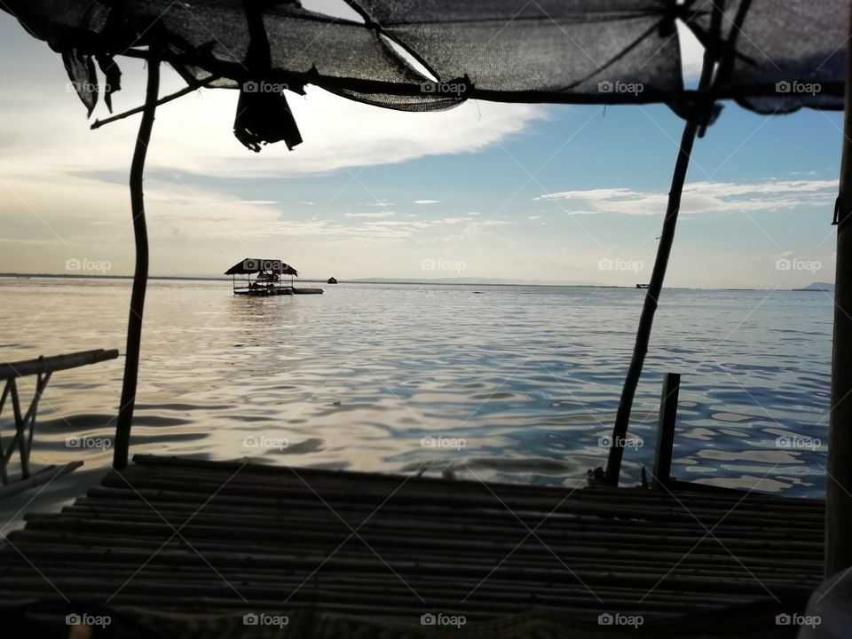 Sit on the raft and enjoy the beauty of the water in the dam.