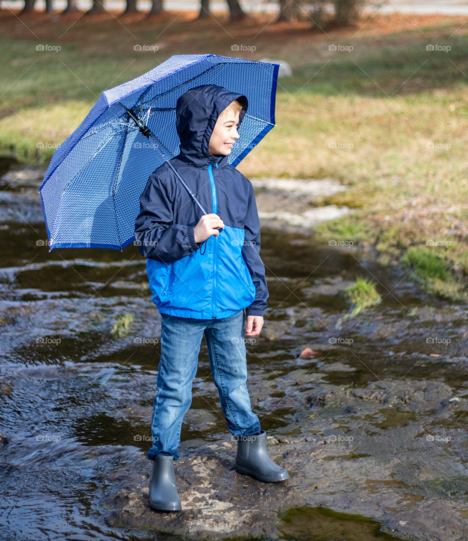 A boy ready for rain