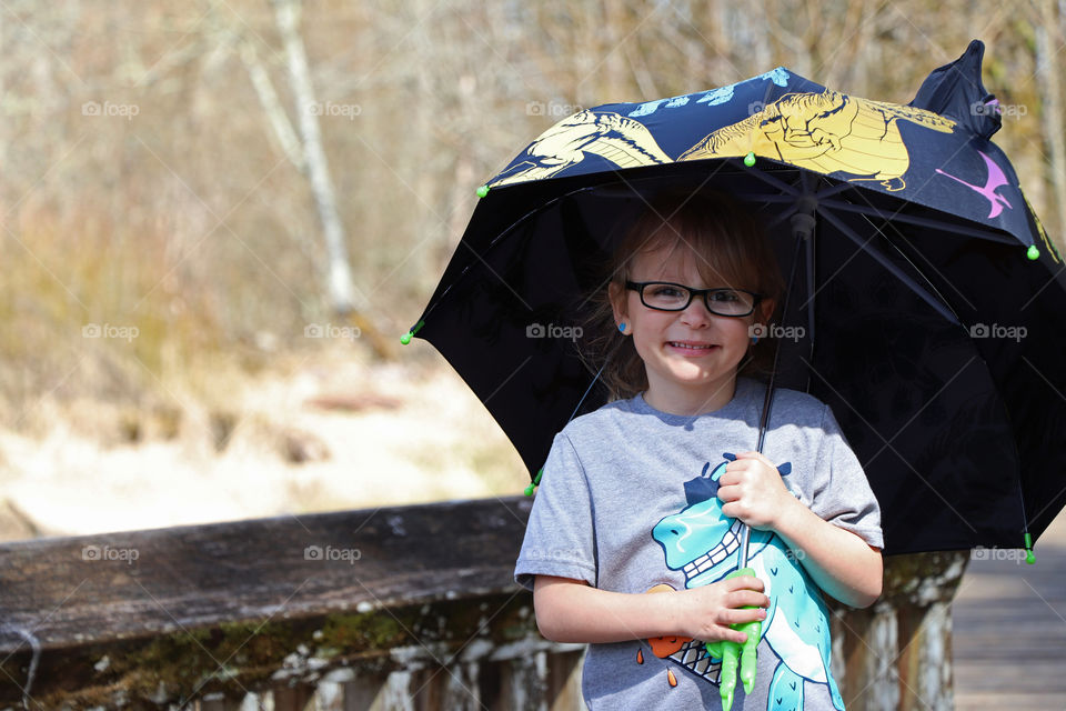 child with umbrella