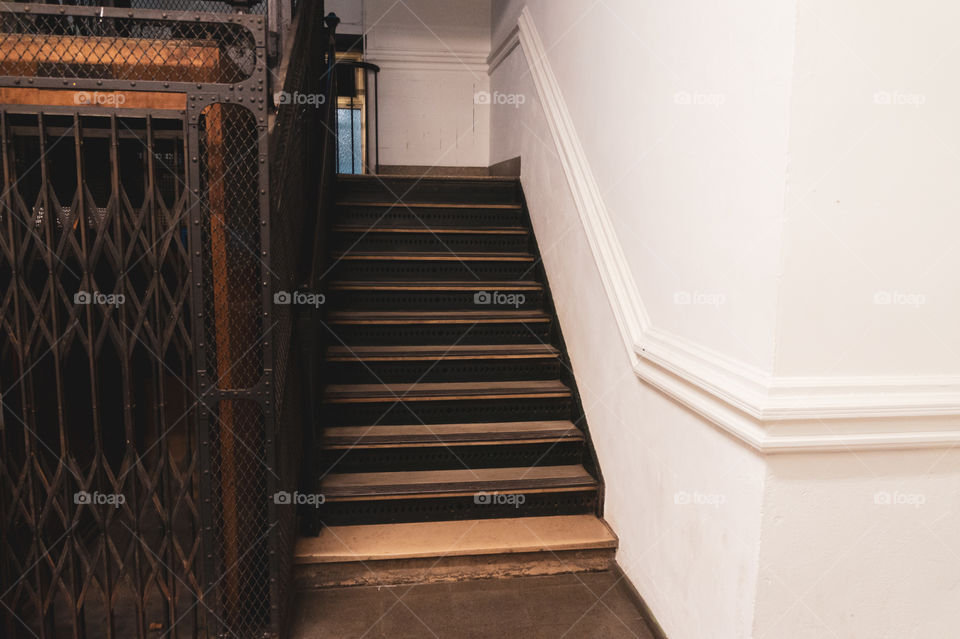 Vintage staircase and white wall
