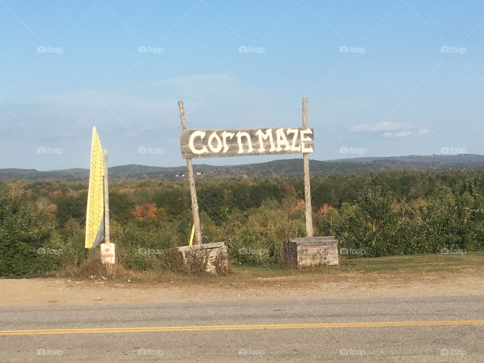 Sign for a corn maze at a family owned farm in Maine 