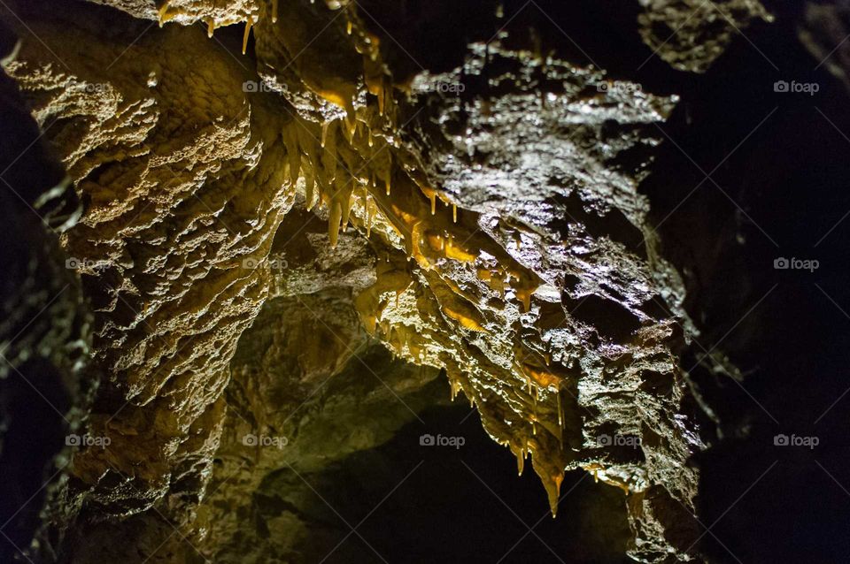 Stalactites on a cave ceiling.