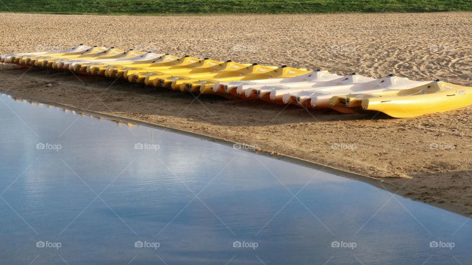 Funboats lined up on the beach