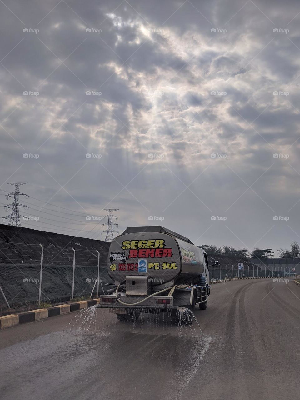 Road watering at  coal ashpond