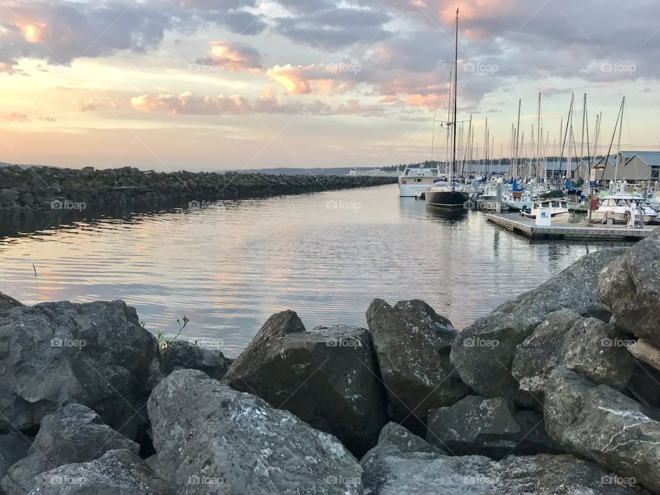 Beautiful Bay Area with ships docked during gorgeous cloudy evening. It is so peaceful. 