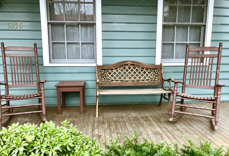 Green Porch with Rocking Chairs