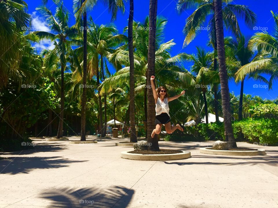 Woman jumping in park