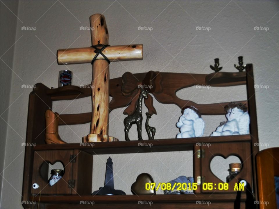 my collections. This is a picture of a group of collectibles that are hand-crafted hanging on my wall