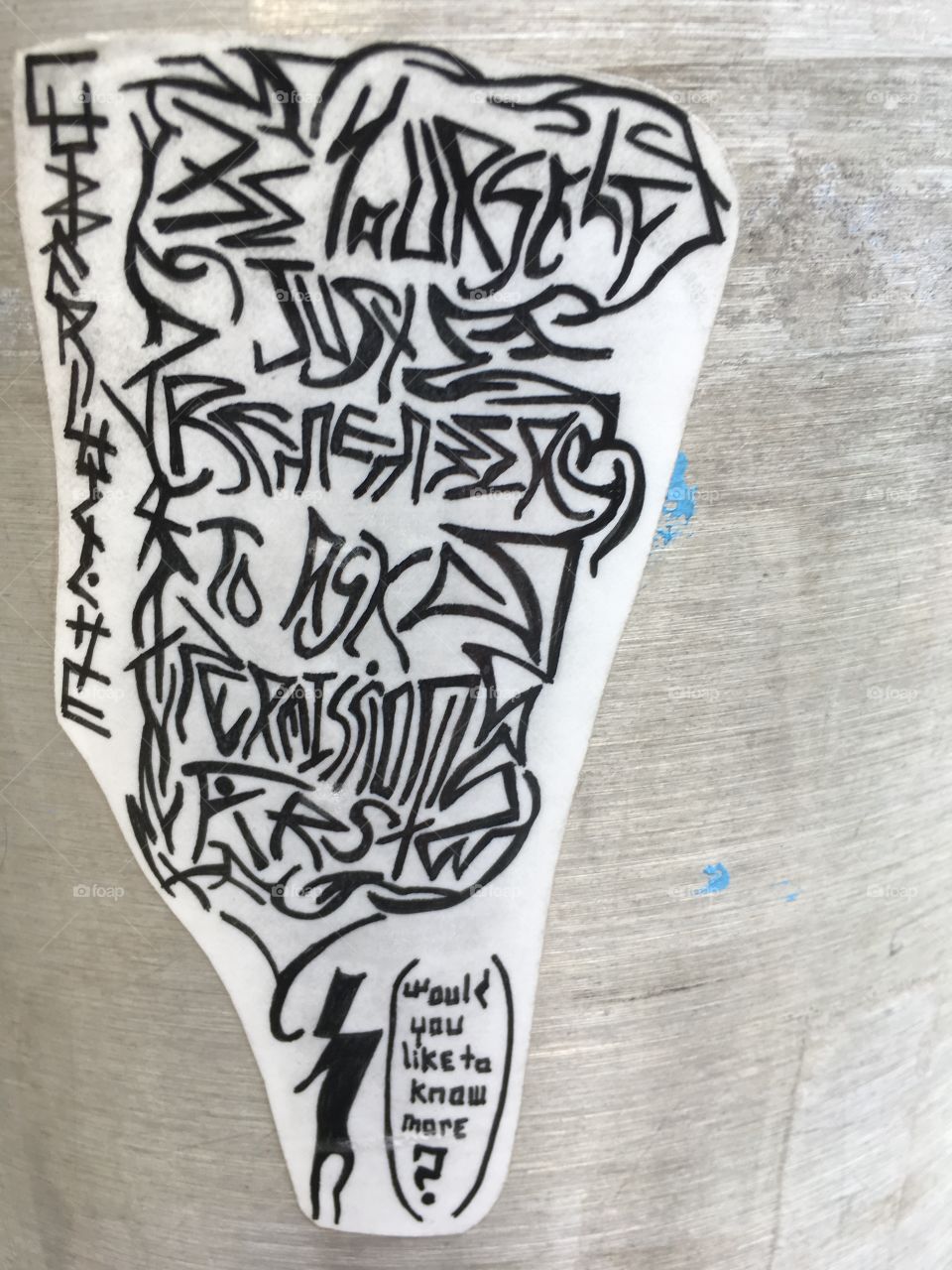 Important message in lamp post...graffiti in Cambridge 