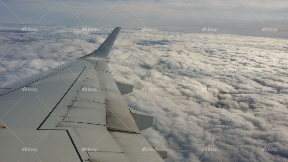 flying over the clouds