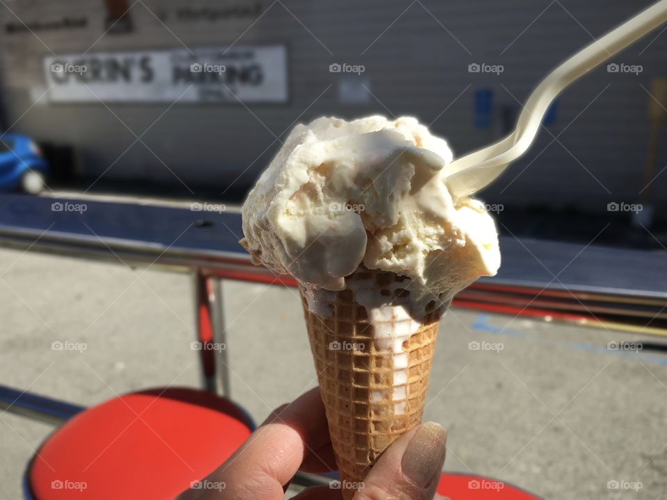 Vanilla ice cream on a cone