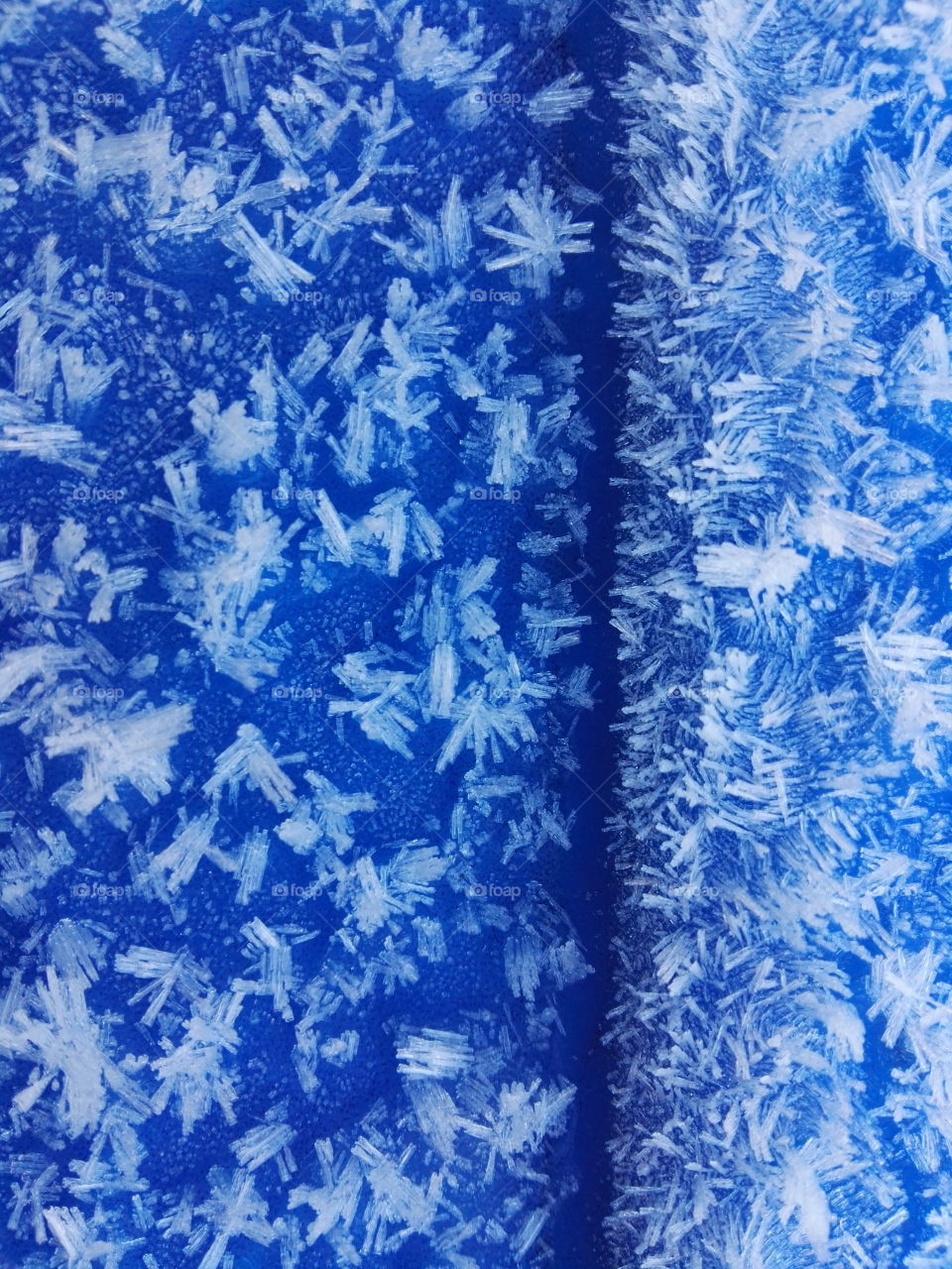 frozen snowflakes on blue background