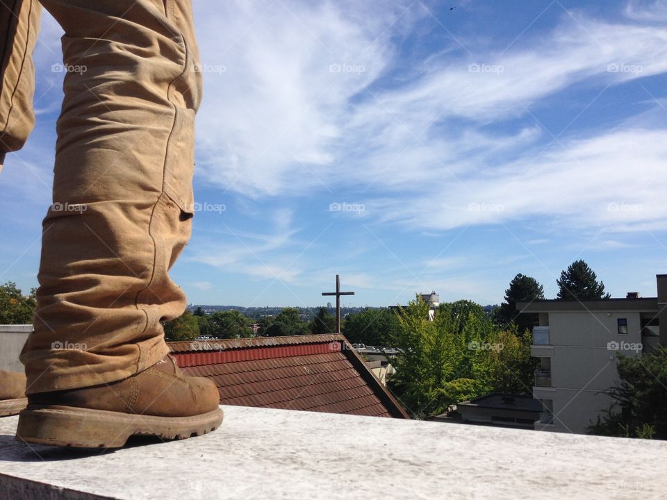 Working on rooftops downtown Vancouver gives a different view of the city. 