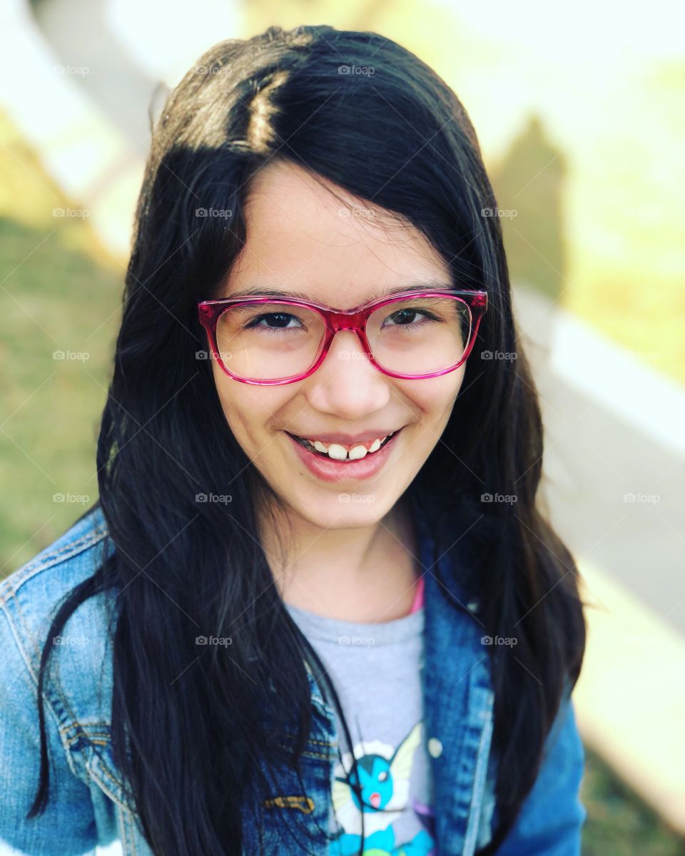 First pair of glasses and a confident smile