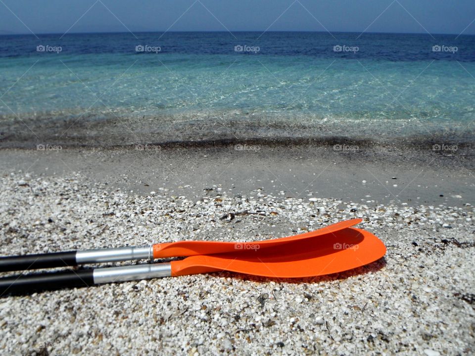 Close-up of a oar on beach