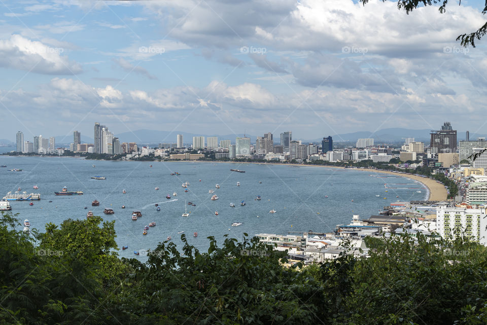 Skyscraper and Boats in Phattaya bay Thailand