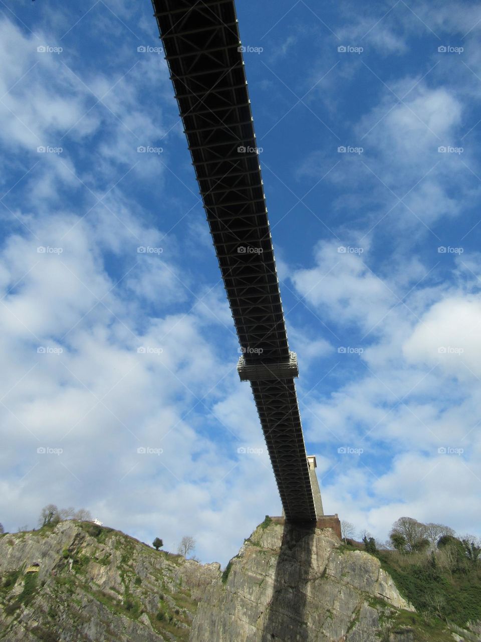 taken from ground level looking up at the great height of clifton suspension bridge