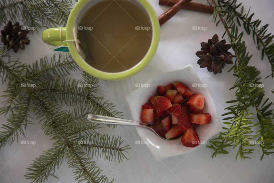 Tea, strawberries and pecan pie in a festive flat lay