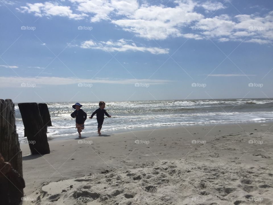Kids Running on the Beach