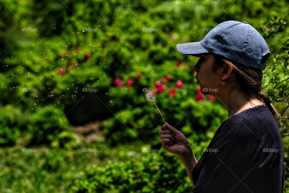 Blowing the dandelion