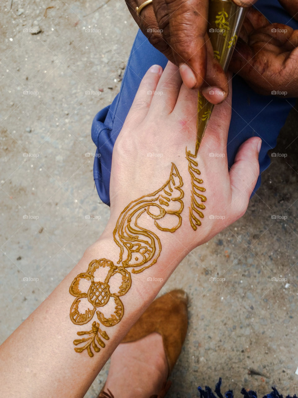 henna art. festival time in Nepal and all girls do henna