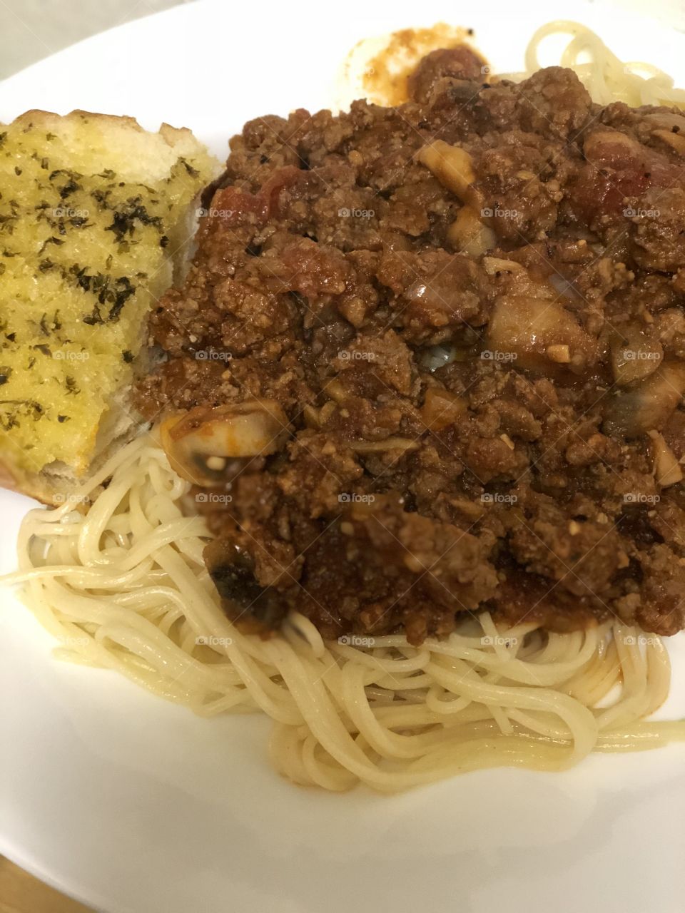 Spaghetti and garlic bread. 