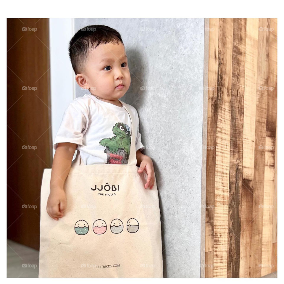asian boy with Korean skincare baby products by JJOBI