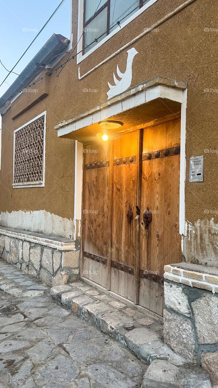 The bright light of an old house in the village