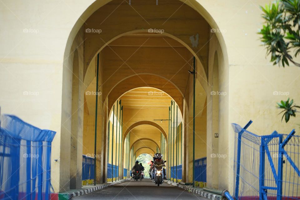 Motorcycle passing the bridge 