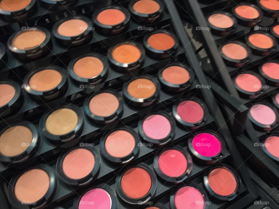 Makeup and eye shadow in a beauty shop in London.