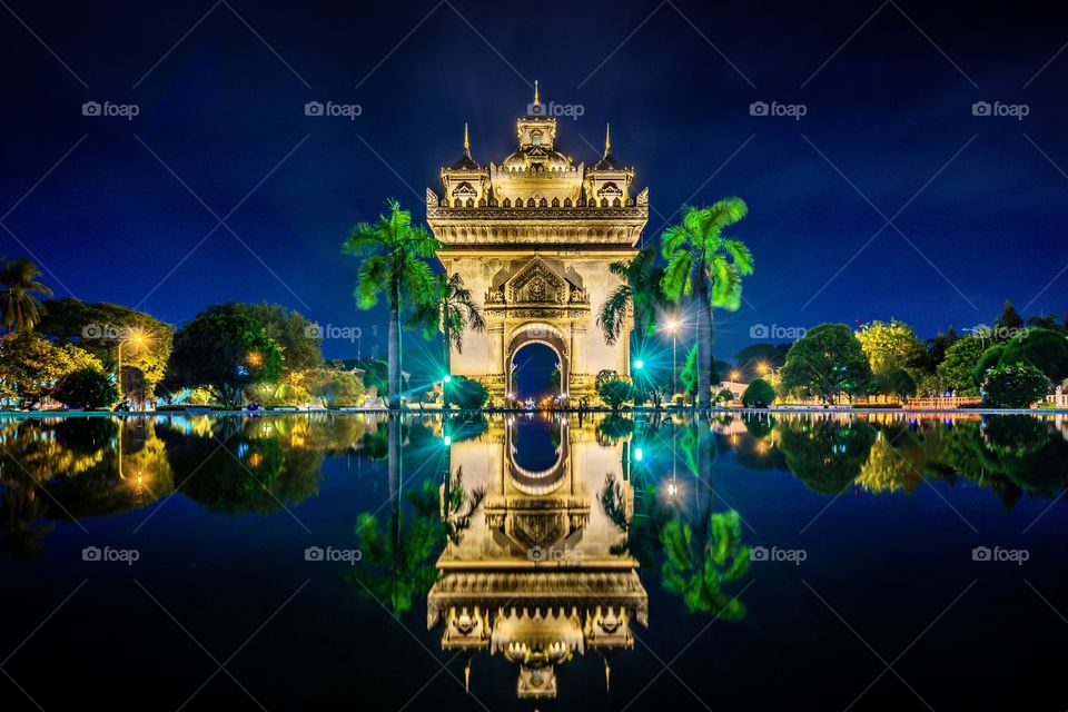 Patuxai Gate of Triumph in Night Light, Vientiane, Laos, Patuxai literally meaning `Gate of Triumph` is the famous landmark in Vientiane known by the French as Monument Aux Morts is a war monument.