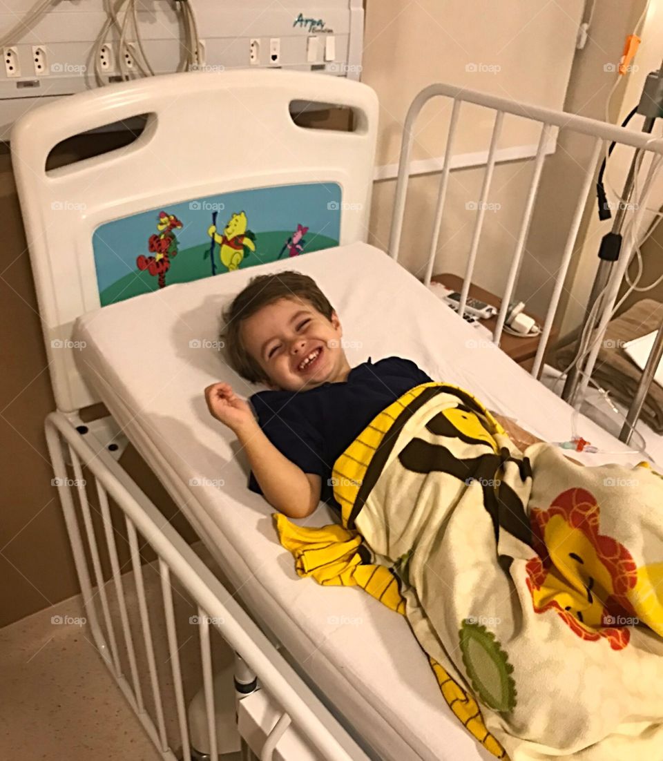 Smiling boy hospitalized 