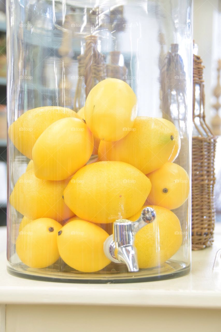 Lemons in a jar for lemonade, fresh fruit