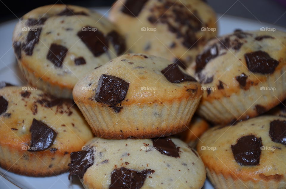 this photo makes you hungry because it represents good homemade muffins with chocolate chips
