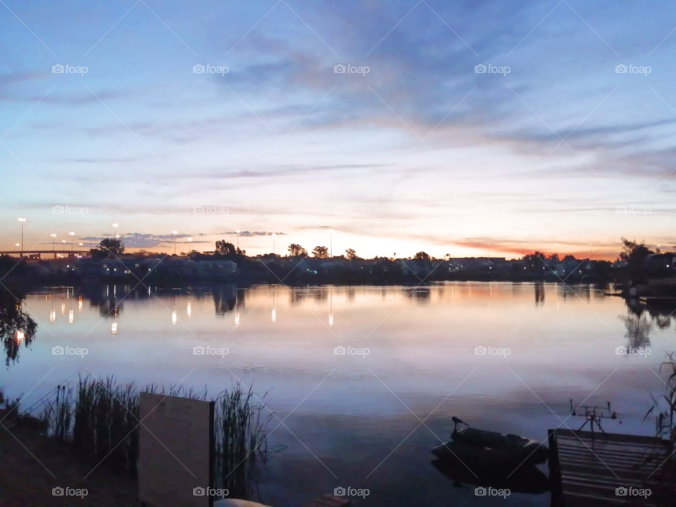 Gorgeous African sunset reflecting on the peaceful waters 🌍