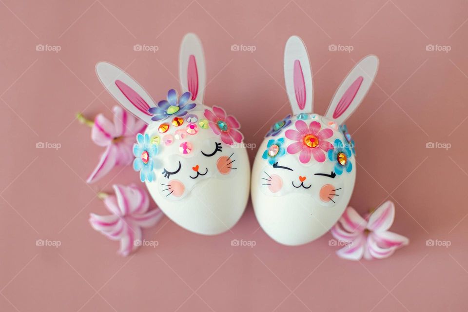 Easter eggs on the pink background.