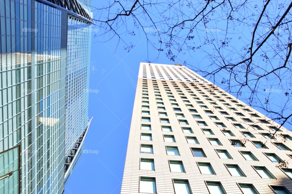 skyscraper viewed from below in Tokyo