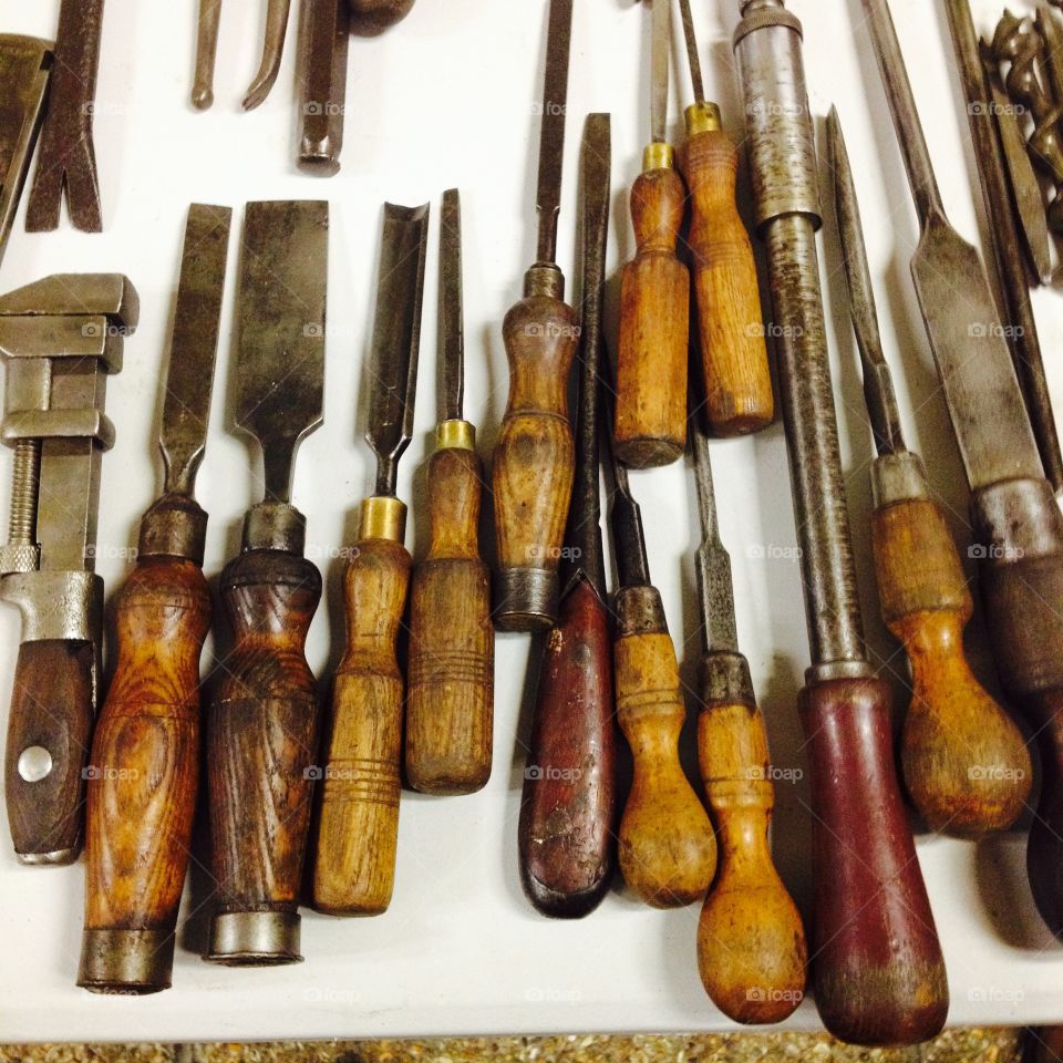 Workman's Tools. Vintage workmans tools laid out on a table
