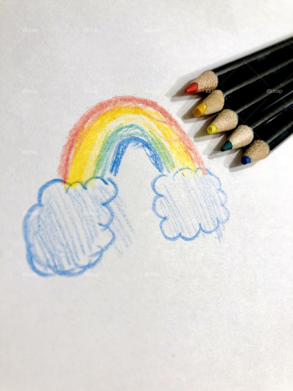 A beautiful rainbow drawn by a little artist with creativity and a sweet passion for drawing.