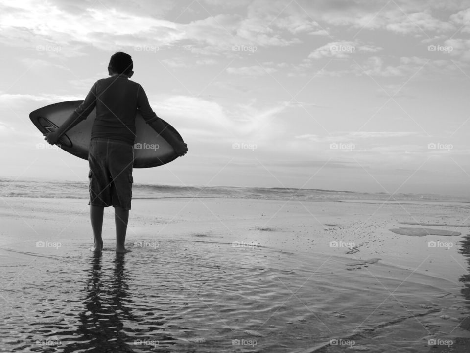 Getting ready to skim board.